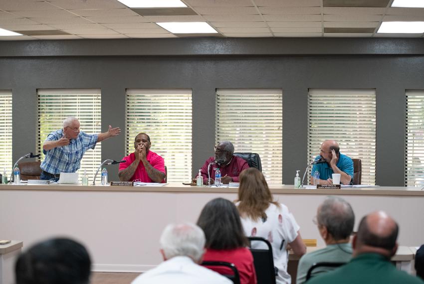 Jasper, Texas: (Far L- Far R) Ronald Sample argues with David Shultz during a city council meeting on June 12, 2023 in Jasper, Texas. Mark Felix/The Texas Tribune